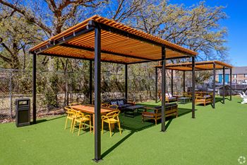 Outdoor living with pergola and grills